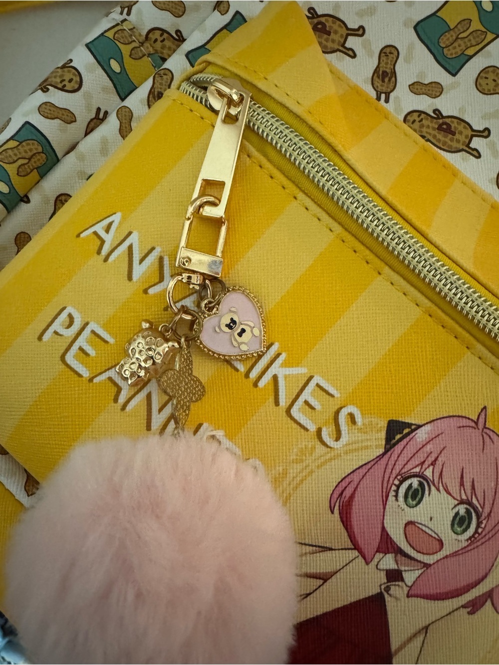 Anya Likes Peanuts Yellow Kids Backpack with Pom Pom Charm - Picture 5 of 11